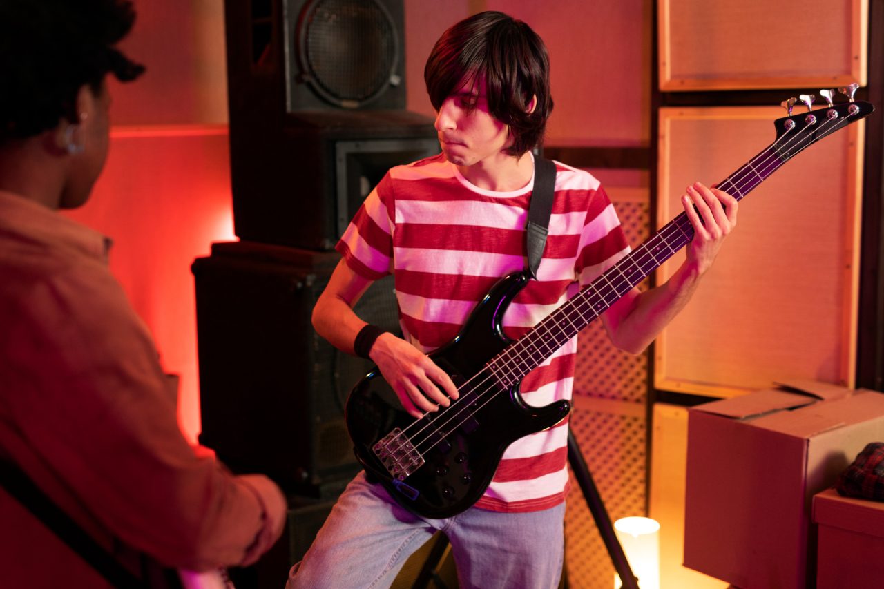 man-playing-electric-guitar-live-concert